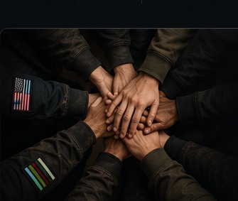 Diverse community members placing their hands together